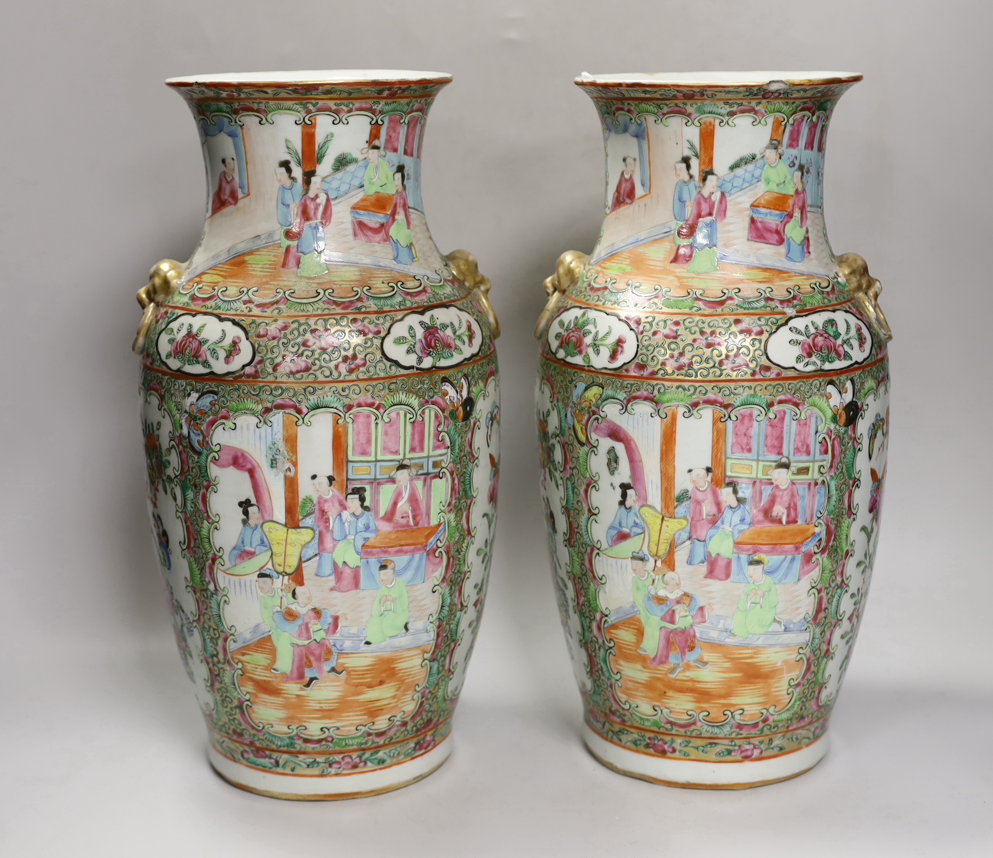 A pair of 19th century Chinese famille rose two handled vases, 36cm